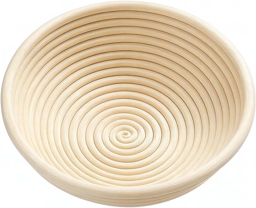 Natural rattan round banneton showing its spiral weave
